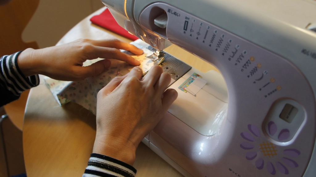Free seamstress sewing fabric image